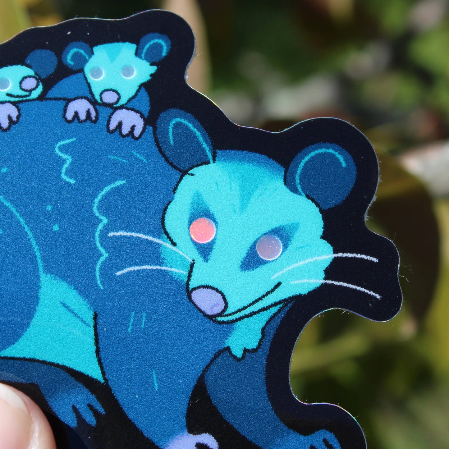 Glowing Eye Opossums Holo 3.5” Sticker