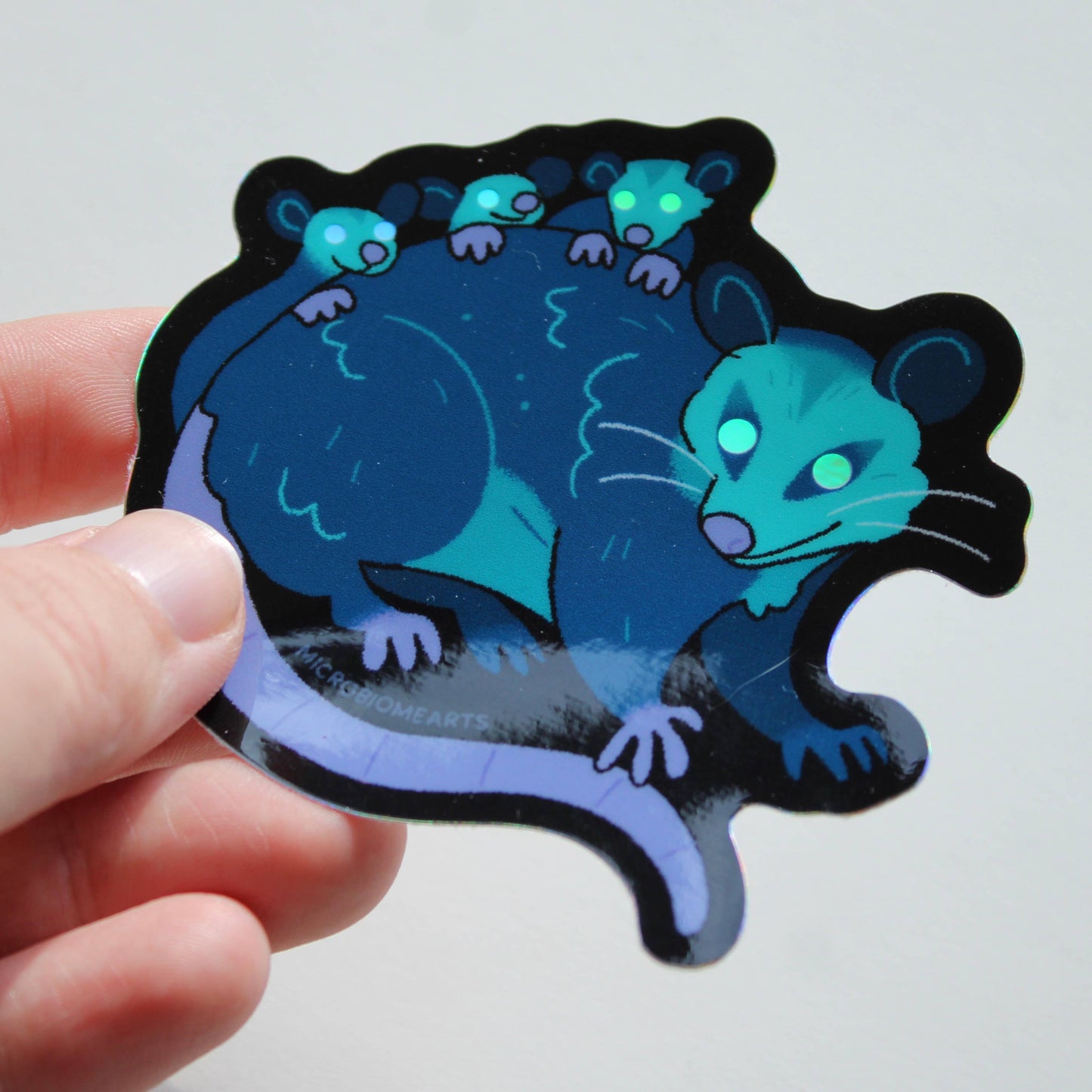 Glowing Eye Opossums Holo 3.5” Sticker
